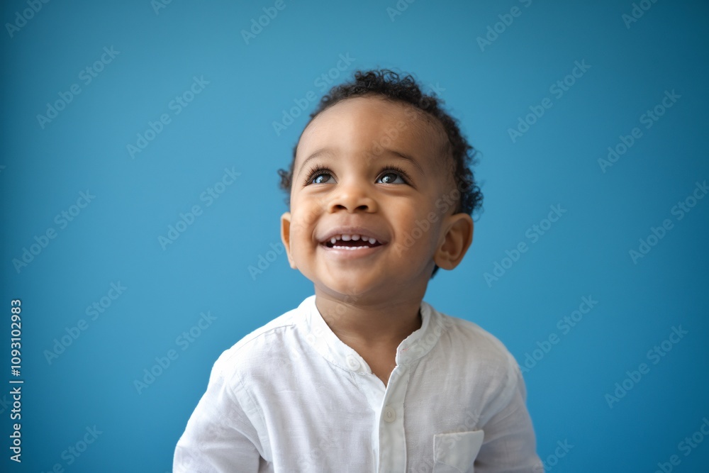 a young child with a bright and joyful expression. a young child with a bright and joyful expression.