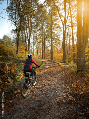 woman cycling with electric...