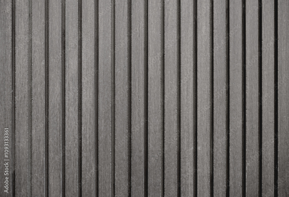 Fototapeta premium Empty dark gray wood wall with groove, abstract wall texture background.Grey wall with patterns, space for work, banner, wallpaper, copy space, decoration and design.