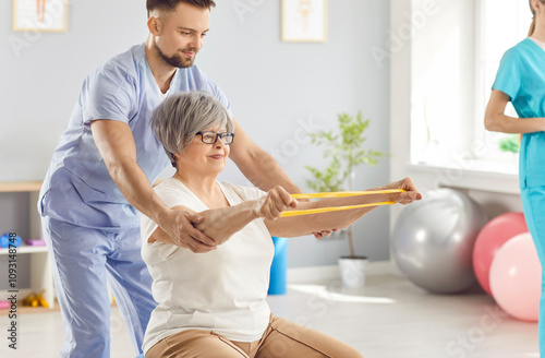 Slika na platnu Senior health care and rehabilitation, physical therapist, nurse or sport instru