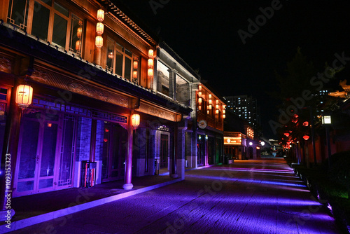 Night street in China (Qingdao city). Street is decorated with Chinese laterns and neon light photo