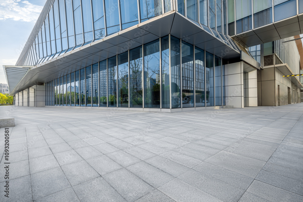 Fototapeta premium Empty brick floor and modern city buildings background