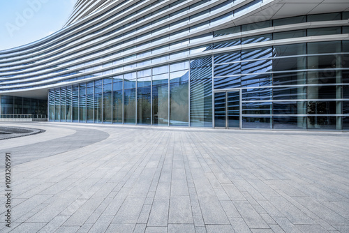 Empty brick floor and modern city buildings background