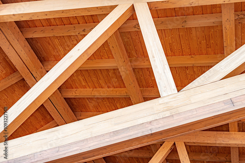 Obraz na płótnie Construction of a wooden roof of a frame house. w salonie