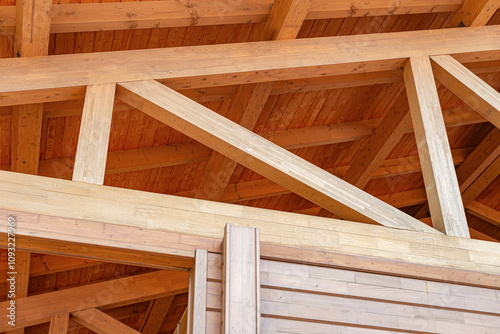 Obraz na płótnie Construction of a wooden roof of a frame house. w salonie