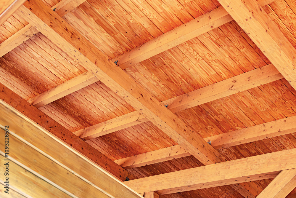 Construction of a wooden roof of a frame house.