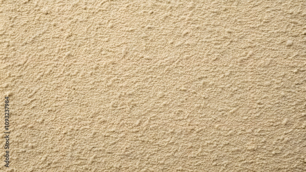 Beige textured wall with rough plaster finish Beige textured wall with rough plaster finish