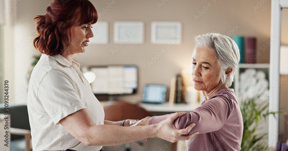 Physio, arm and senior woman with injury support, patient and rehabilitation in clinic with stretching. Physical therapy, helping and healing assessment of doctor with arthritis care and joint check Physio, arm and senior woman with injury support, patient and rehabilitation in clinic with stretching. Physical therapy, helping and healing assessment of doctor with arthritis care and joint check
