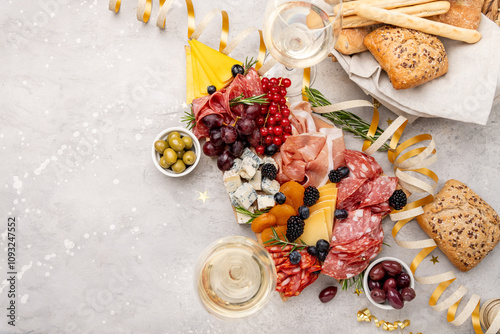 Photography Party charcuterie board italian food antipasti prosciutto ham, salami and cheese appetizers served in the shape of a Christmas tree