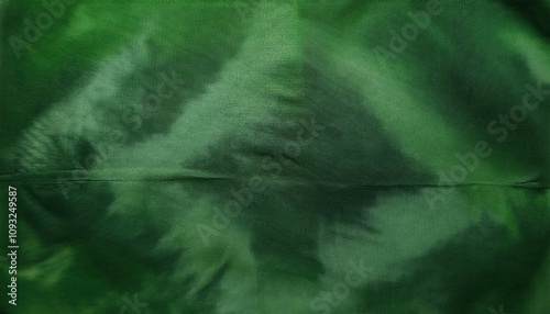 Green color tie dye fabric texture background photo