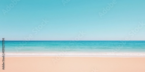 A serene beach scene featuring golden sand and turquoise water under a clear blue sky.