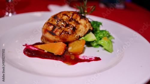 Grilled Tuna served with carrots, potatoes, broccoli with red sauce