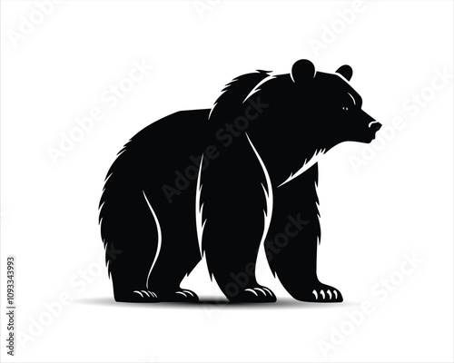 Black silhouette of a bear in a standing profile view. Layered vector illustration. Bear, shadow and background on separate layers.