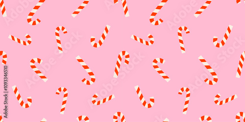 Vector seamless pattern with Christmas candy canes. Wrapping paper design for winter holidays