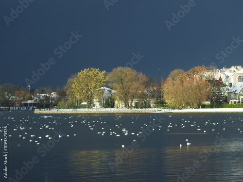 upper lake in kaliningrad, russia, with heavy winter clouds photo