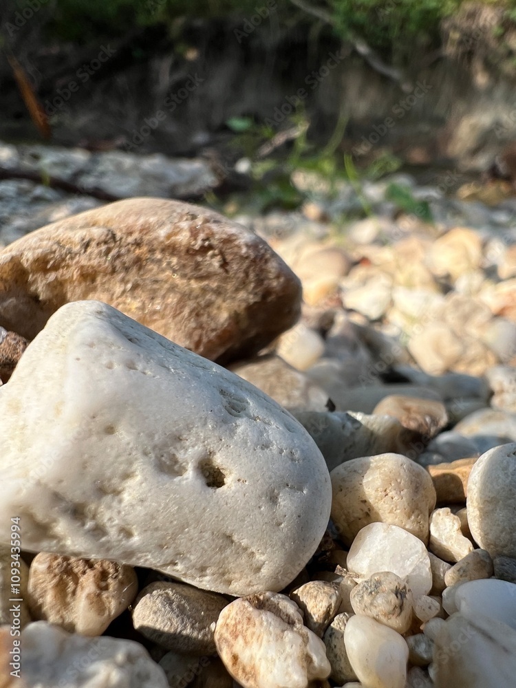 vacation theme by the beach with stones in the foreground vacation theme by the beach with stones in the foreground
