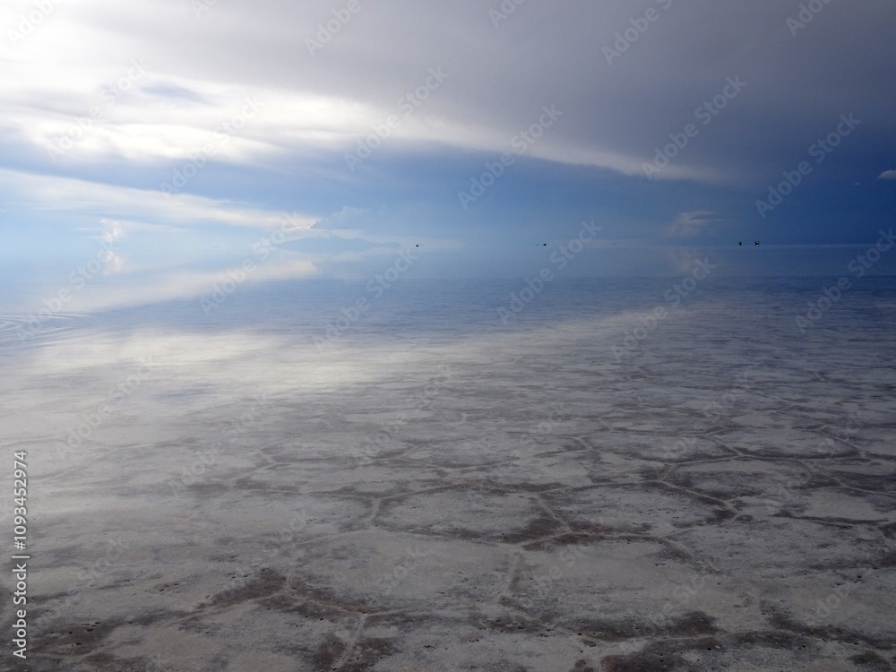 Reflection of cloud sky in the Salar de Uyuni, bolivia. Flooded salt flat in South America. Salt desert landscape Reflection of cloud sky in the Salar de Uyuni, bolivia. Flooded salt flat in South America. Salt desert landscape