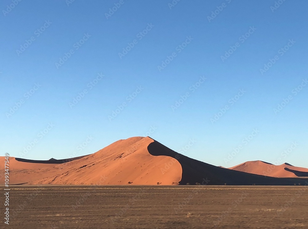 Stunning red sand dunes in the Namib Desert, Namibia Stunning red sand dunes in the Namib Desert, Namibia