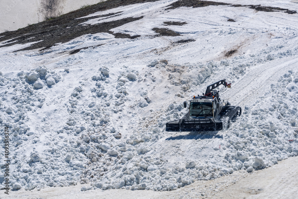 The snow tractor snowcat, snow groomer is ready for work, confidently standing against the backdrop of a snowy landscape, embodying power and reliability in winter conditions The snow tractor snowcat, snow groomer is ready for work, confidently standing against the backdrop of a snowy landscape, embodying power and reliability in winter conditions
