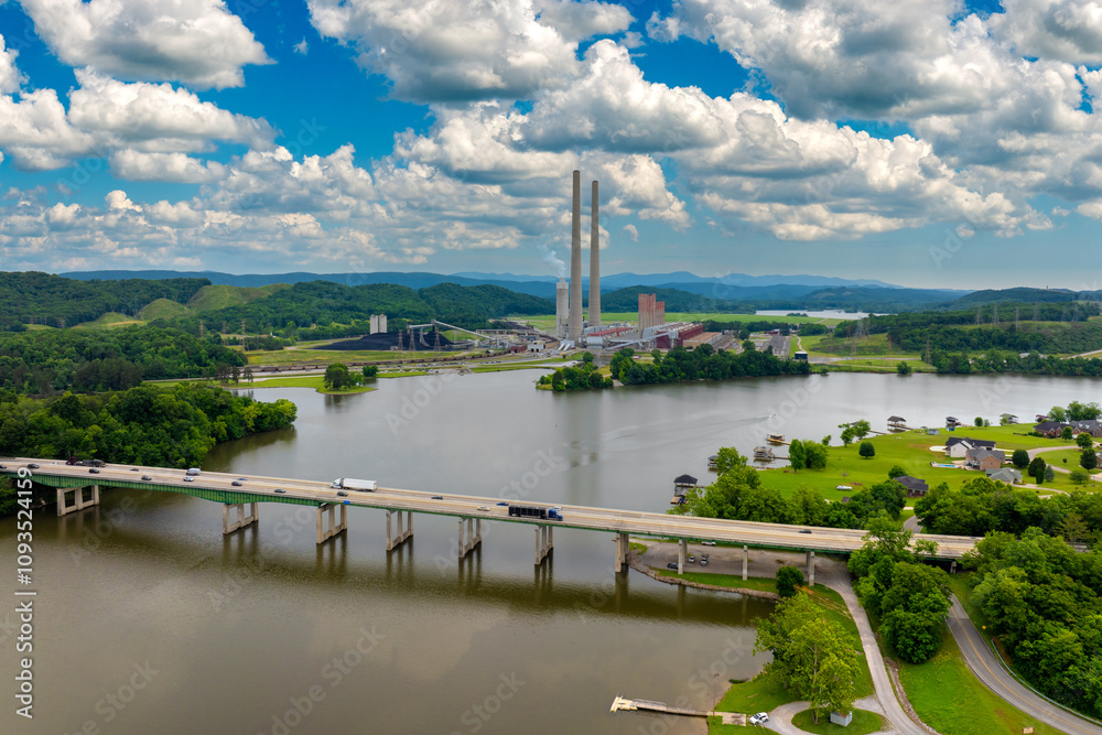 Naklejka premium Large thermal Kingston power plant in Roane County near Kingston, Tennessee. Coal used as fossil fuel for electric energy production in American grid
