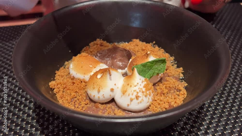 Panna cotta chocolate dessert, eat dessert with a spoon with cream, coffee and chocolate flavor. A traditional dessert of the north of italy, from the Piedmont region.
