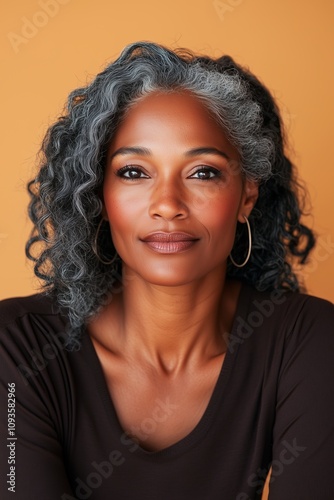 fifty year old black woman with grey hair, beautiful beauty shot, portrait photo