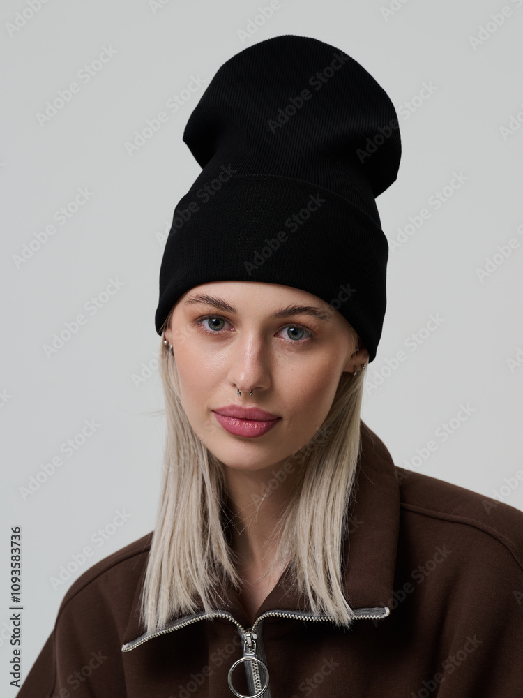 Portrait of woman in hat, blonde model with blue eyes. Portrait of woman in hat, blonde model with blue eyes.