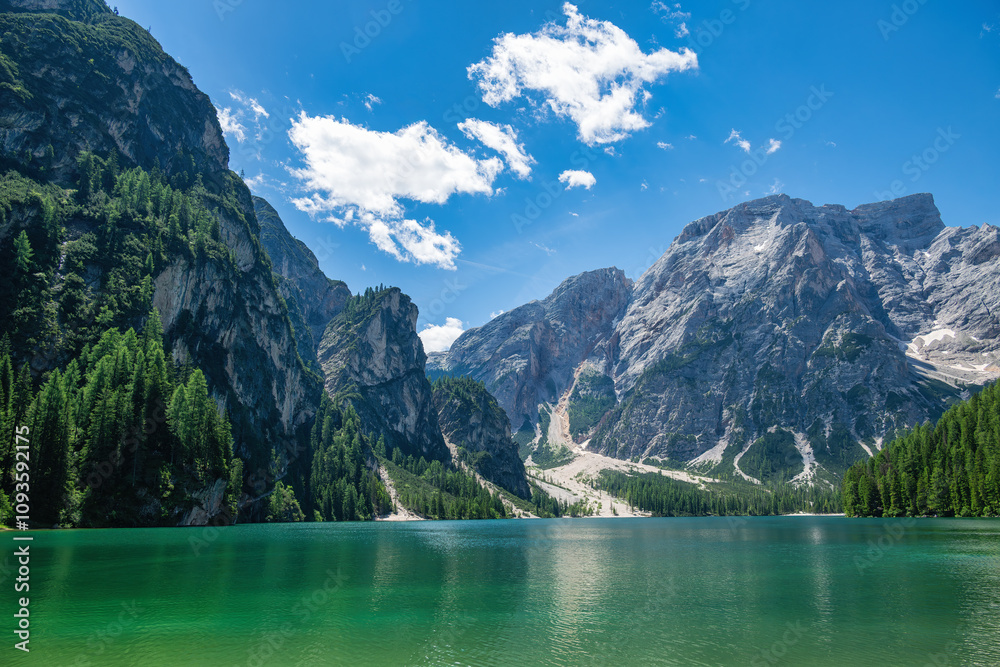 A pic of the majestic Dolomite mountains with a lake in the foreground A pic of the majestic Dolomite mountains with a lake in the foreground