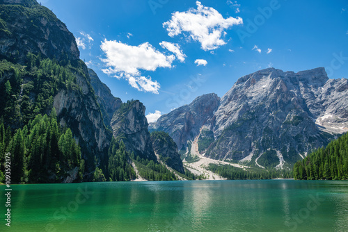 A pic of the majestic Dolomite mountains with a lake in the foreground 
