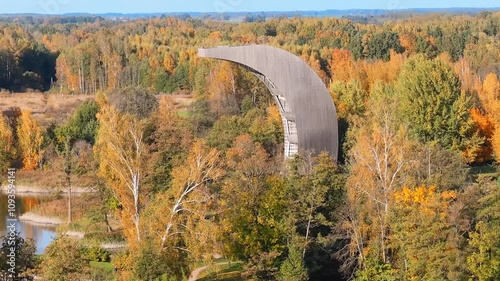 Amazing aerial view of Kirkilai karst lakes and lookout tower in the bright sunny autumn morning, Birzai eldership, Panevezys county, Lithuania photo