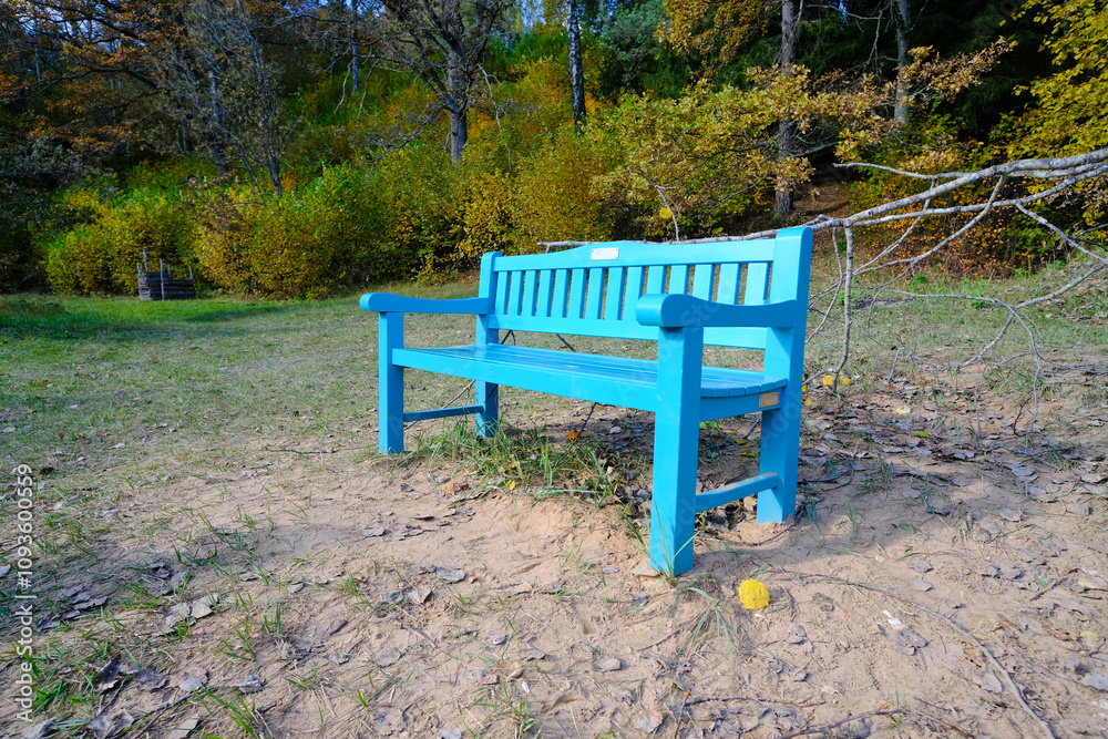 Blue Bench in Peaceful Autumn Park Blue Bench in Peaceful Autumn Park