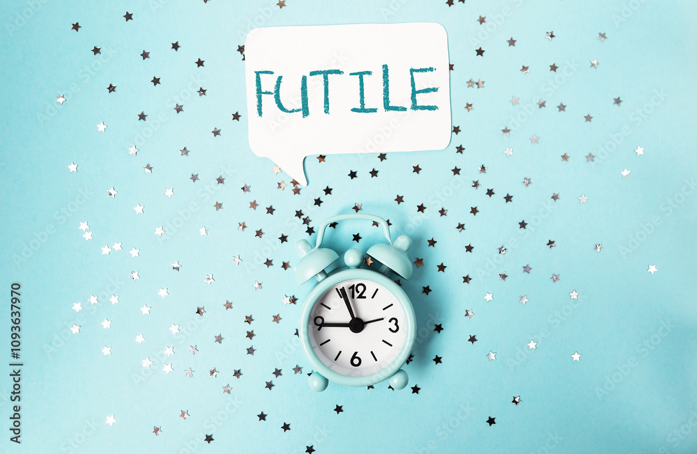 Clock with the word futile written above it Clock with the word futile written above it