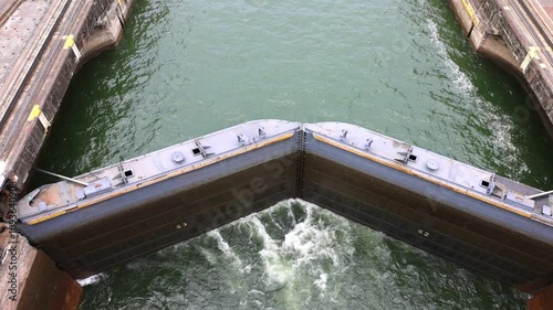 Panama Canal with locks connecting Atlantic and Pacific for global commerce shipments navigation. photo