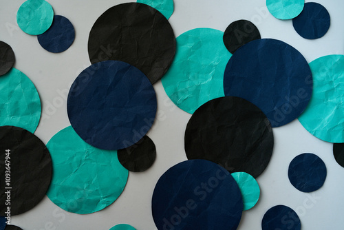 Blue, teal and black paper dots	