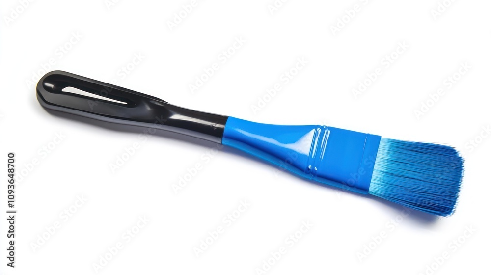 A blue and black paintbrush isolated on a white background. A blue and black paintbrush isolated on a white background.
