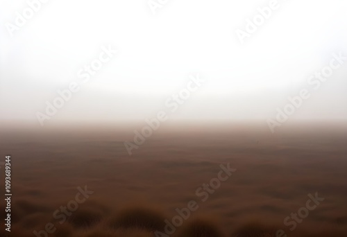 A vast, dusty landscape shrouded in a hazy, brown fog, with the horizon barely visible