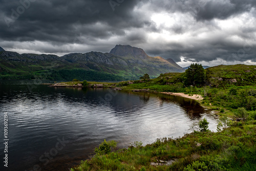 View Over Lake Loch Maree Near Talladale To Mountain Slioch In The Highlands Of Scotland, UK photo