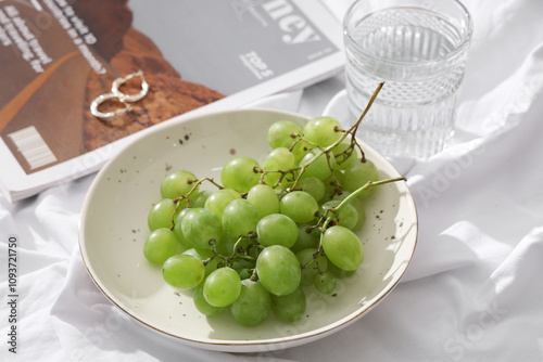 Plate with sweet ripe grape...