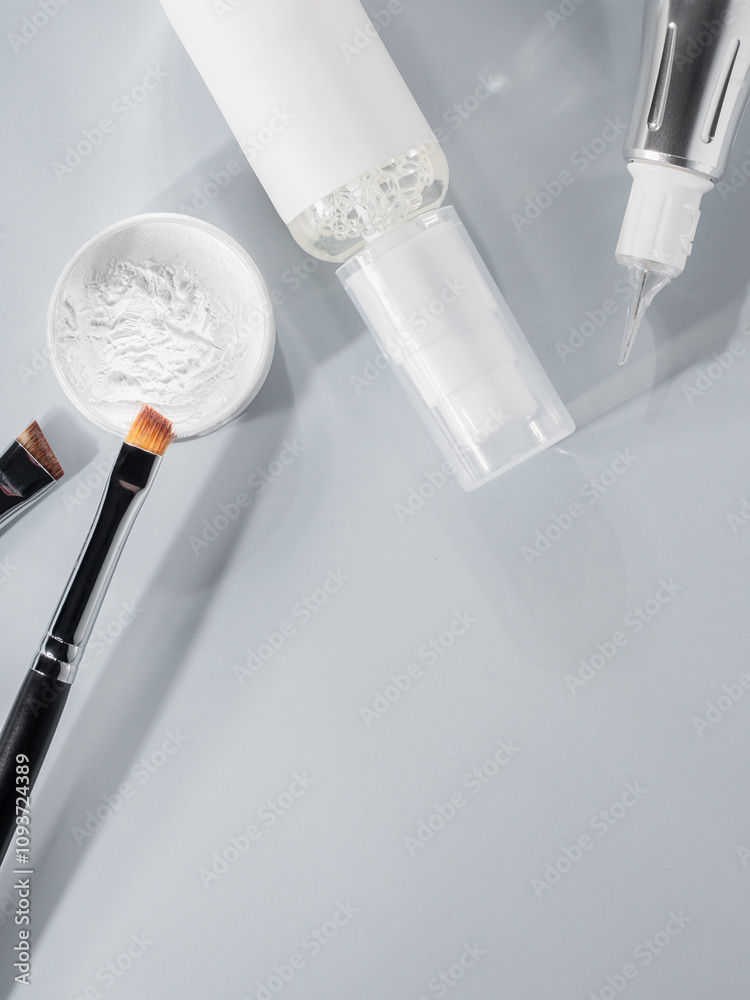 Fabulous Cosmetic Products on a Grey Background for Beauty Enthusiasts valuing aesthetics