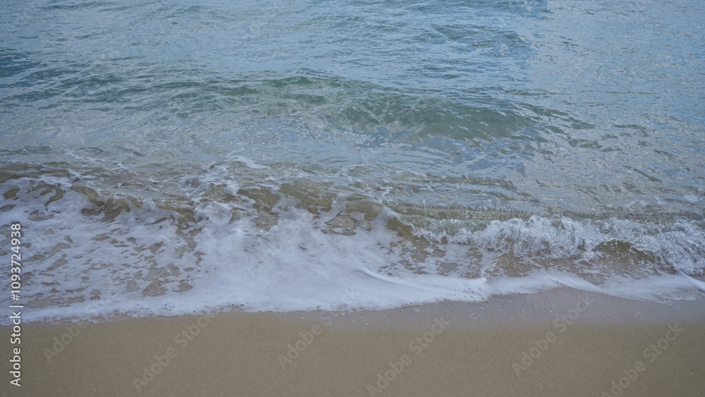 Gentle waves lap the sandy shore of pescoluse beach in salento, puglia, italy, showcasing the tranquil beauty of the mediterranean sea's coastline. Gentle waves lap the sandy shore of pescoluse beach in salento, puglia, italy, showcasing the tranquil beauty of the mediterranean sea's coastline.