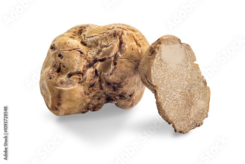 Billede på lærred Whole Alba white truffle next to a cut one isolated