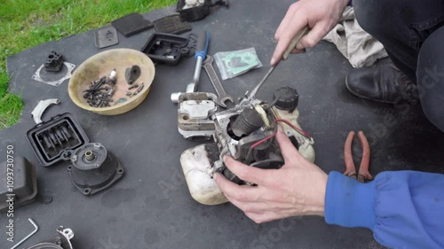 a broken trimmer is disassembled, remove old gasket on brushcutter, replace gasket in brushcutter