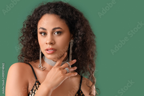Elegant young woman with cu...
