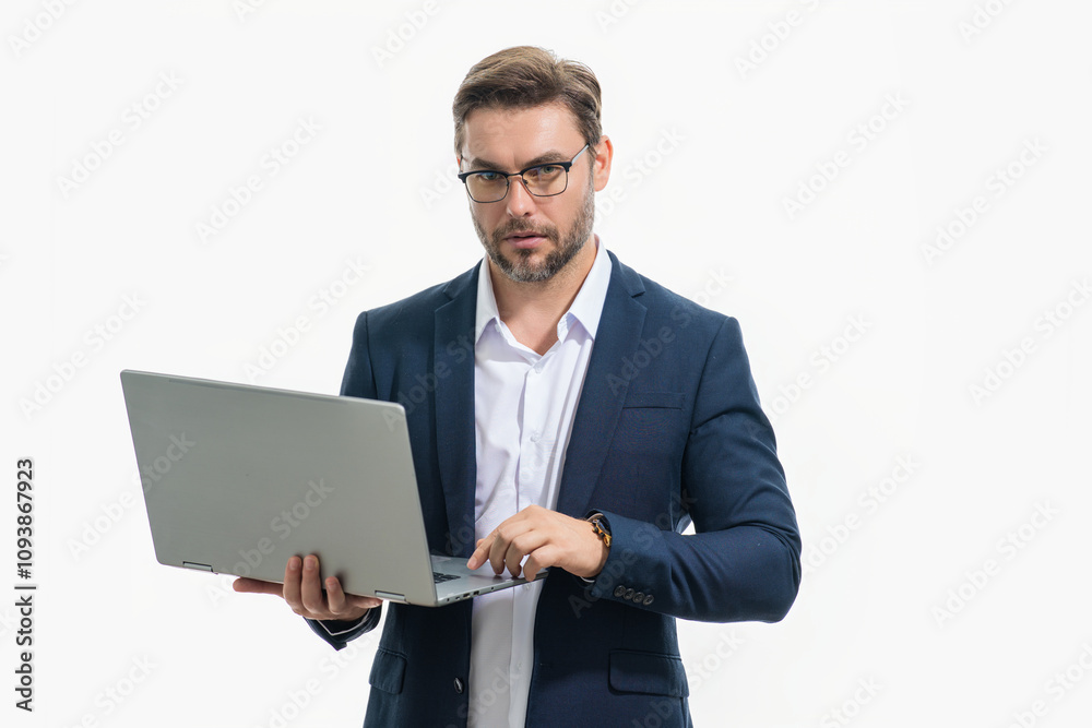 Business man using laptop. Male business man worker watch video on computer laptop. Serious business man hold laptop computer. Caucasian business man in glasses work with laptop, studio portrait. Business man using laptop. Male business man worker watch video on computer laptop. Serious business man hold laptop computer. Caucasian business man in glasses work with laptop, studio portrait.