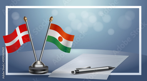 Denmark and Niger National flags on small table with bokeh background, cooperative relationship