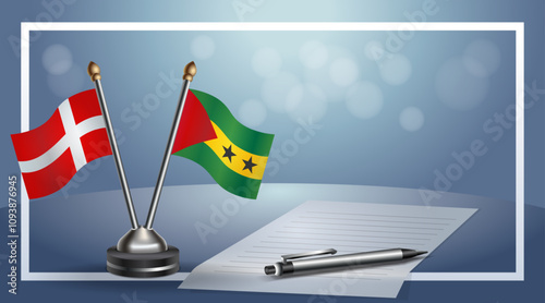 Denmark and Sao Tome and Principe National flags on small table with bokeh background, cooperative relationship