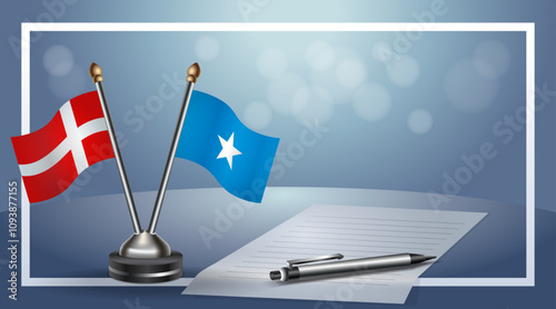 Denmark and Somalia National flags on small table with bokeh background, cooperative relationship