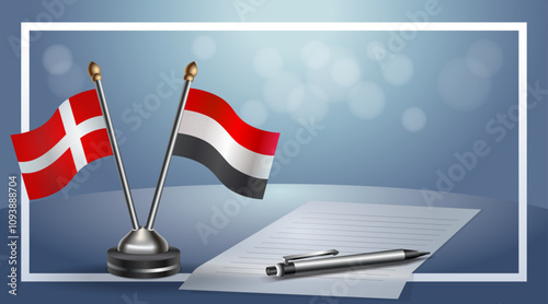 Denmark and Yemen National flags on small table with bokeh background, cooperative relationship