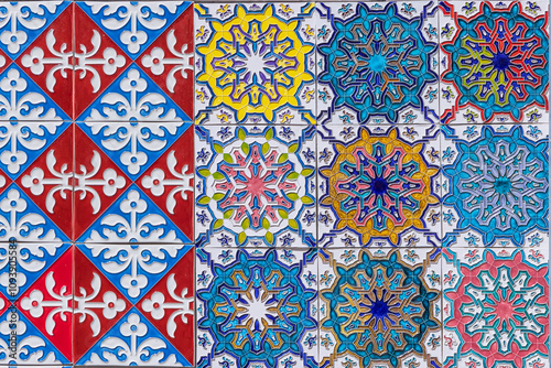 Portugal, Lisbon. Colorful traditional decorative tiles, known as azulejo on a building.
