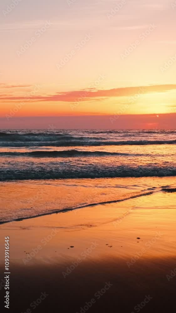 Atlantic ocean sunset with surging waves at Fonte da Telha beach, Costa da Caparica, Portugal. Camera pan Atlantic ocean sunset with surging waves at Fonte da Telha beach, Costa da Caparica, Portugal. Camera pan
